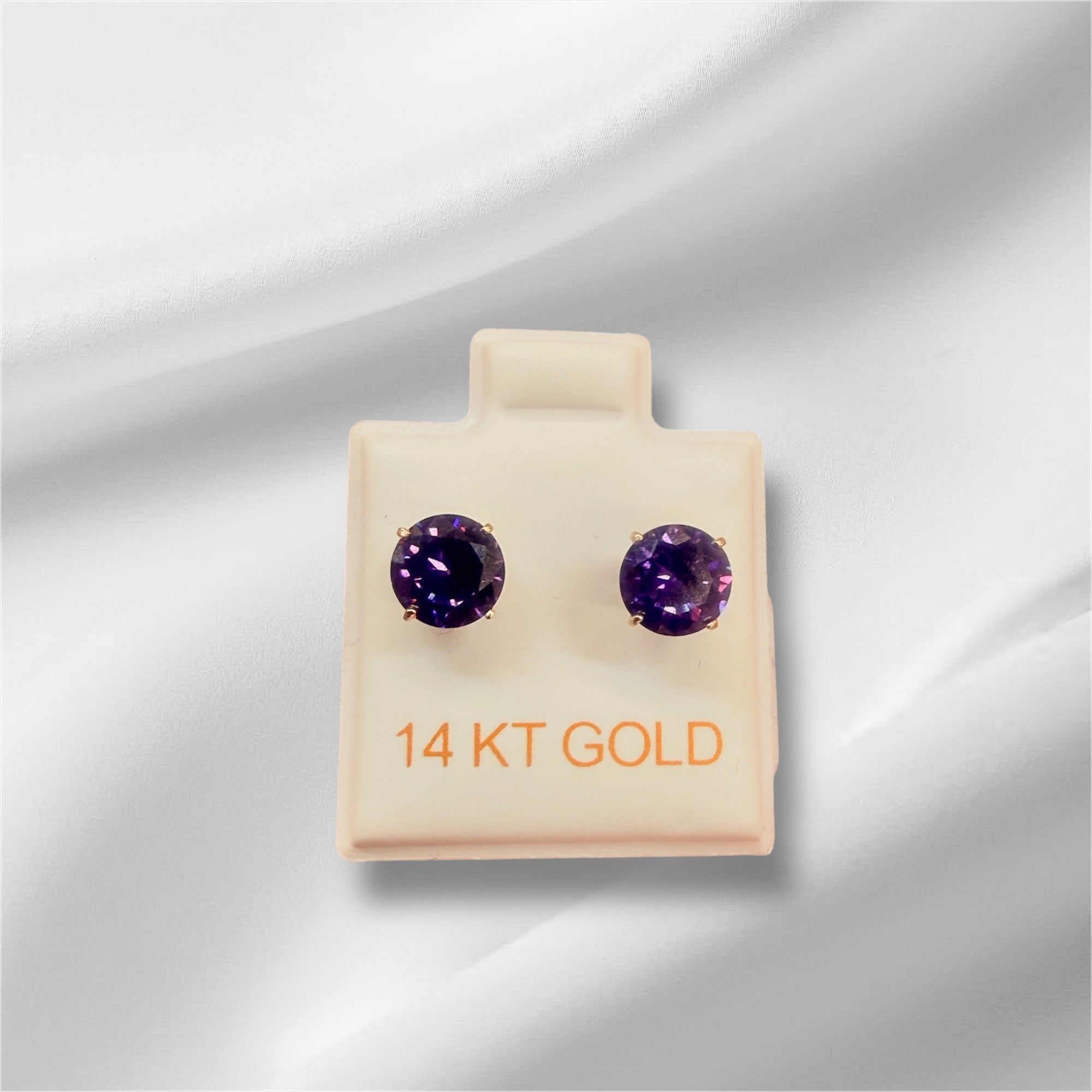 Broqueles de circonia en oro 14k