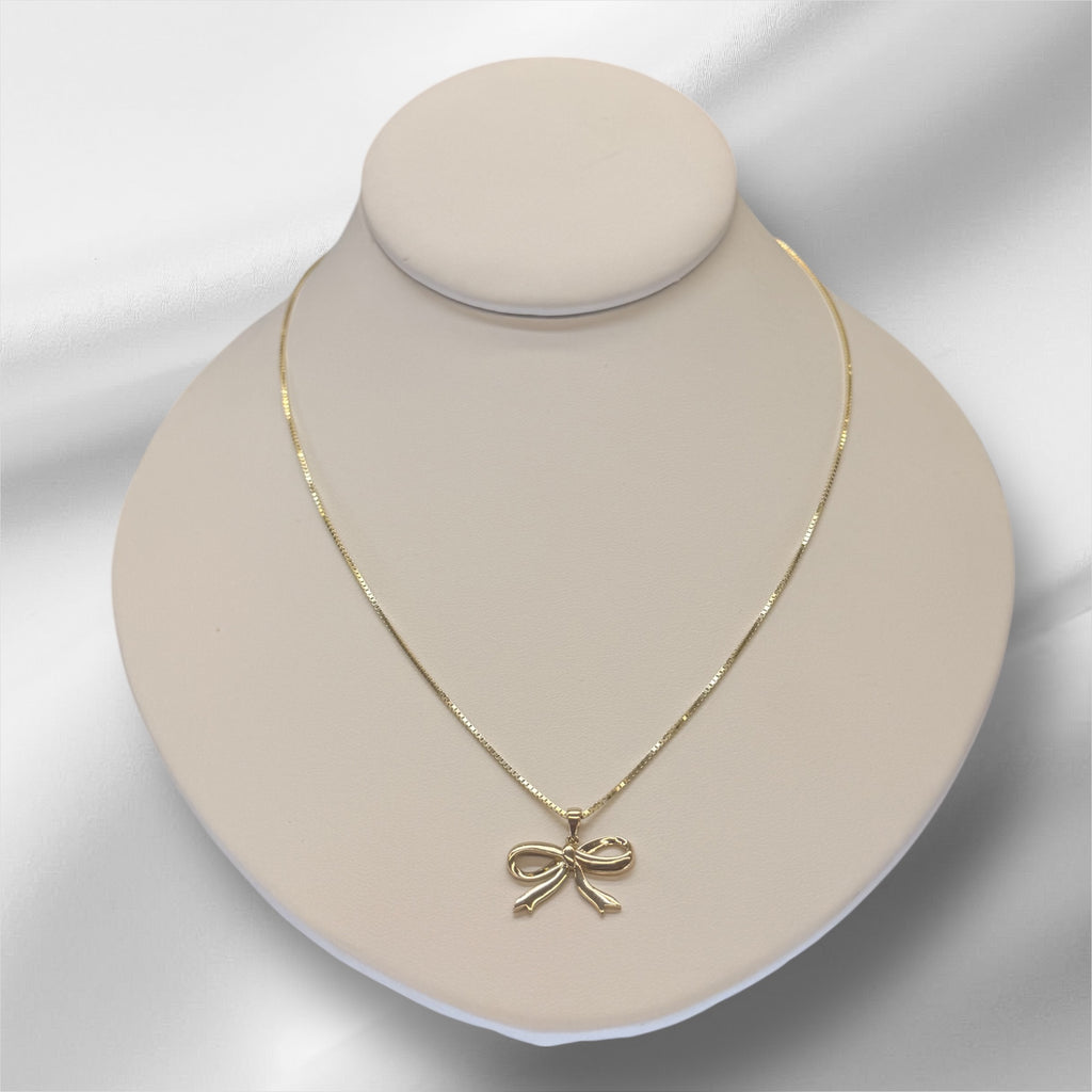 Cadena de cajita 18’’ oro 14k y dije de moñito