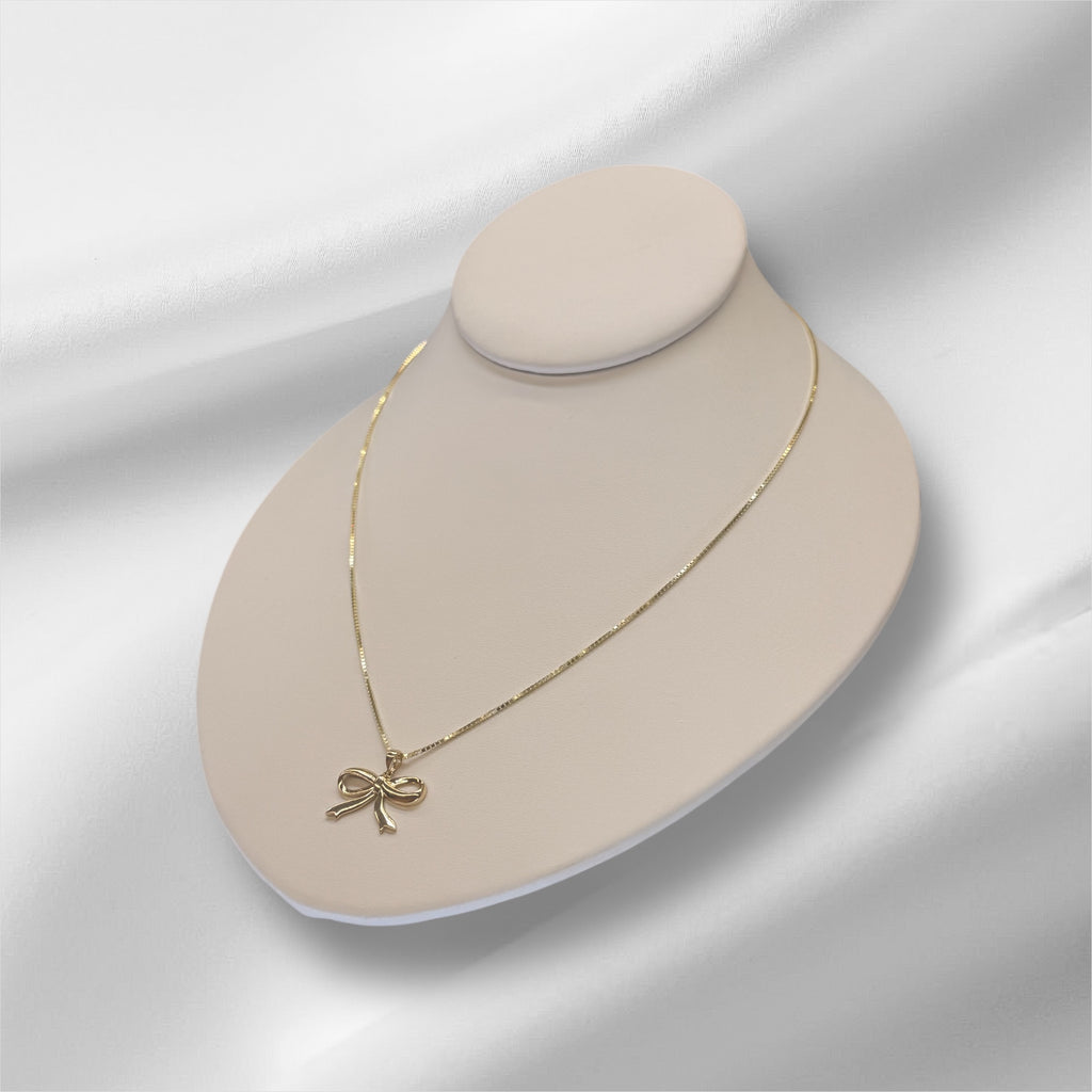 Cadena de cajita 18’’ oro 14k y dije de moñito