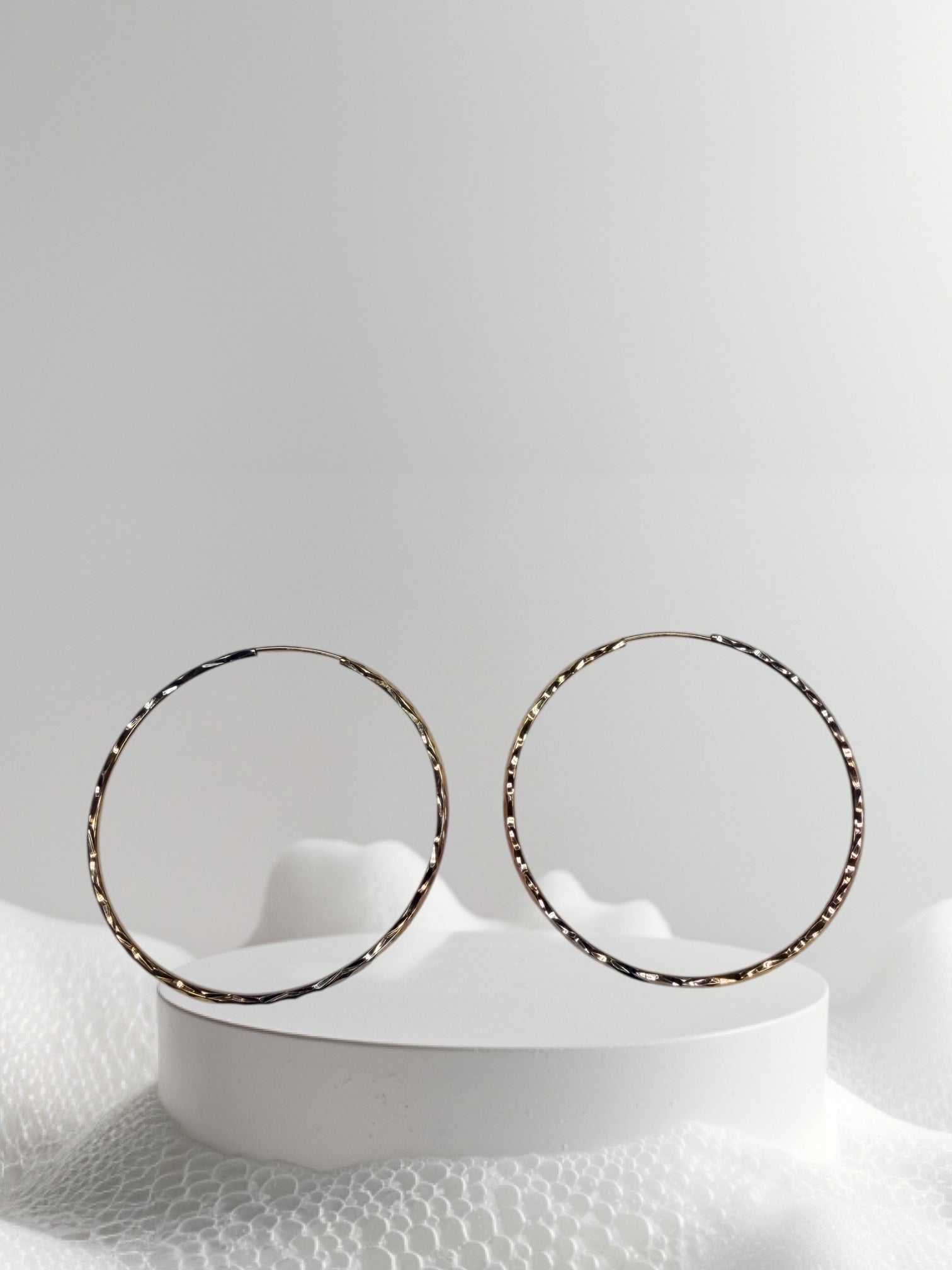 Argollas de tres tonos oro 14k