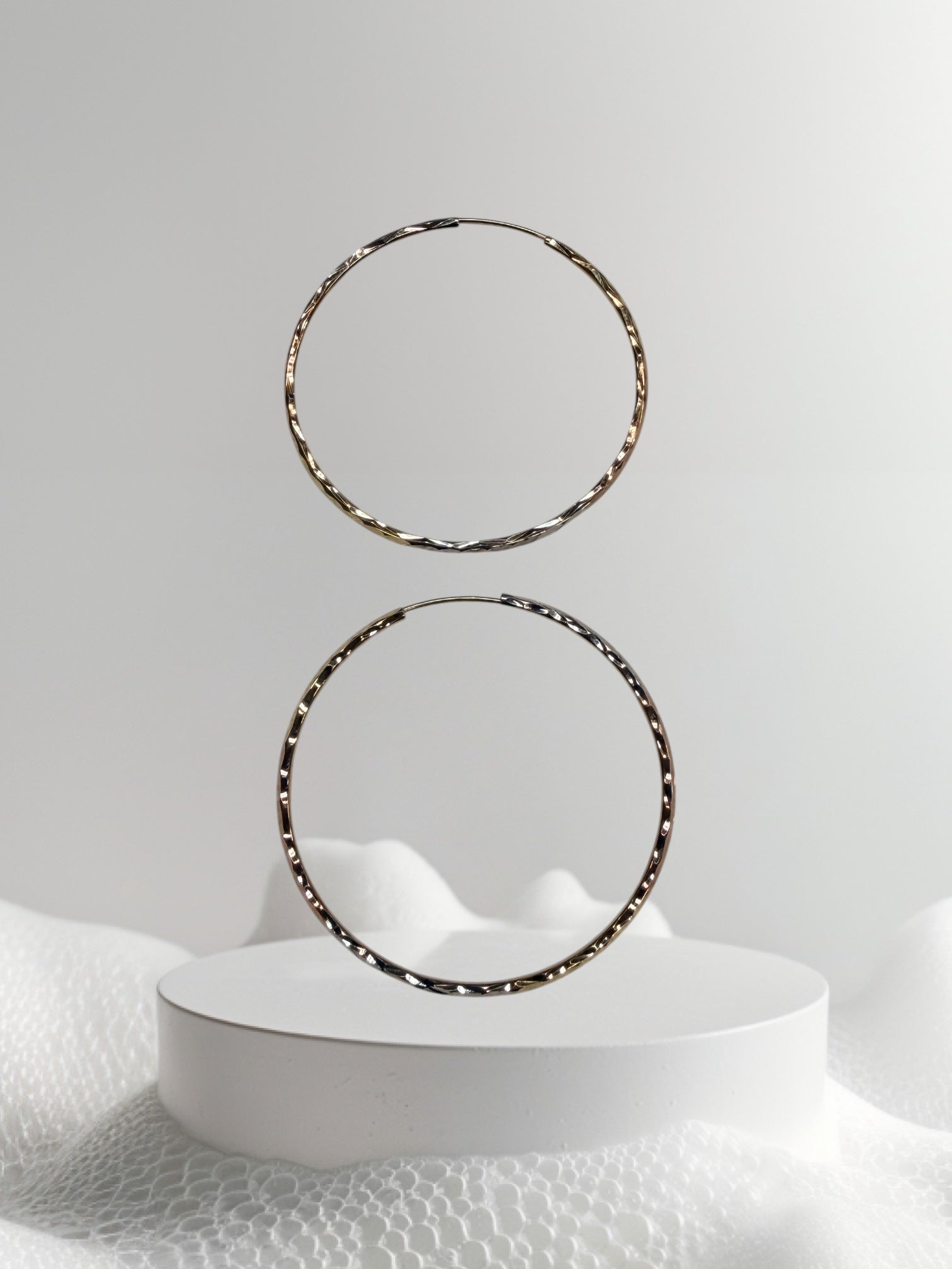 Argollas de tres tonos oro 14k