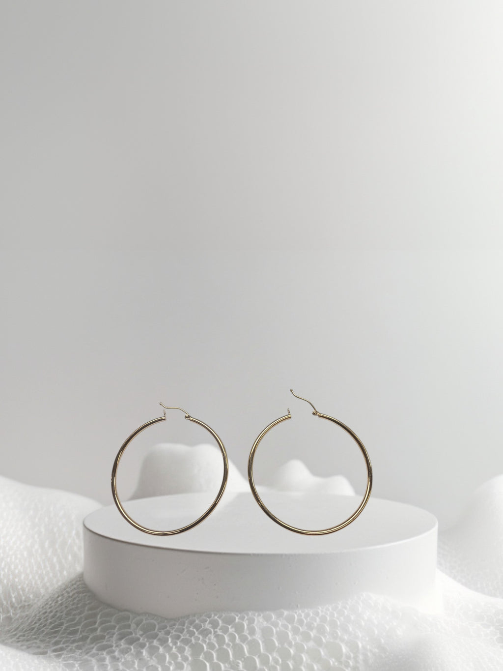 Argollas semi sólidas lisas en oro 14k