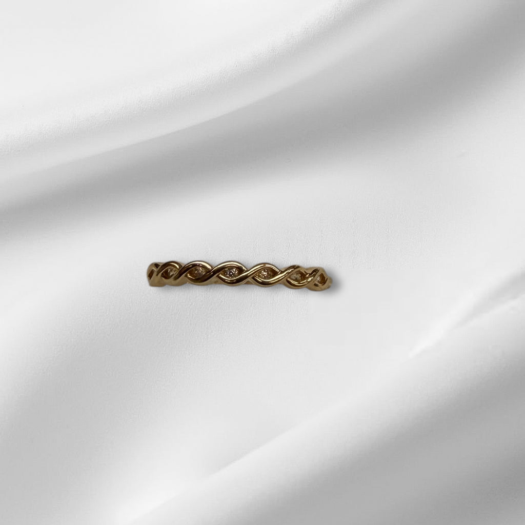 Anillo trenzado  oro 14k