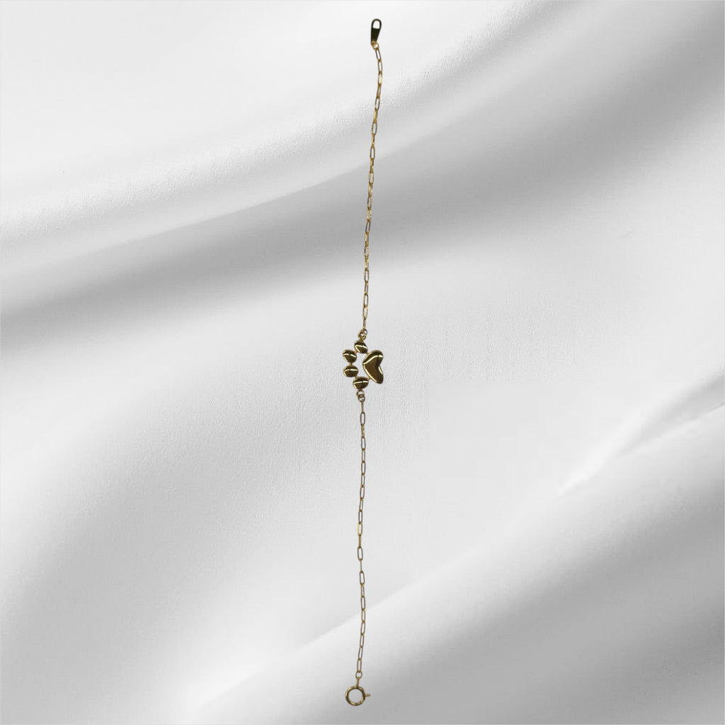Esclava paperclirp con huella de perrito 7.25” oro 14k