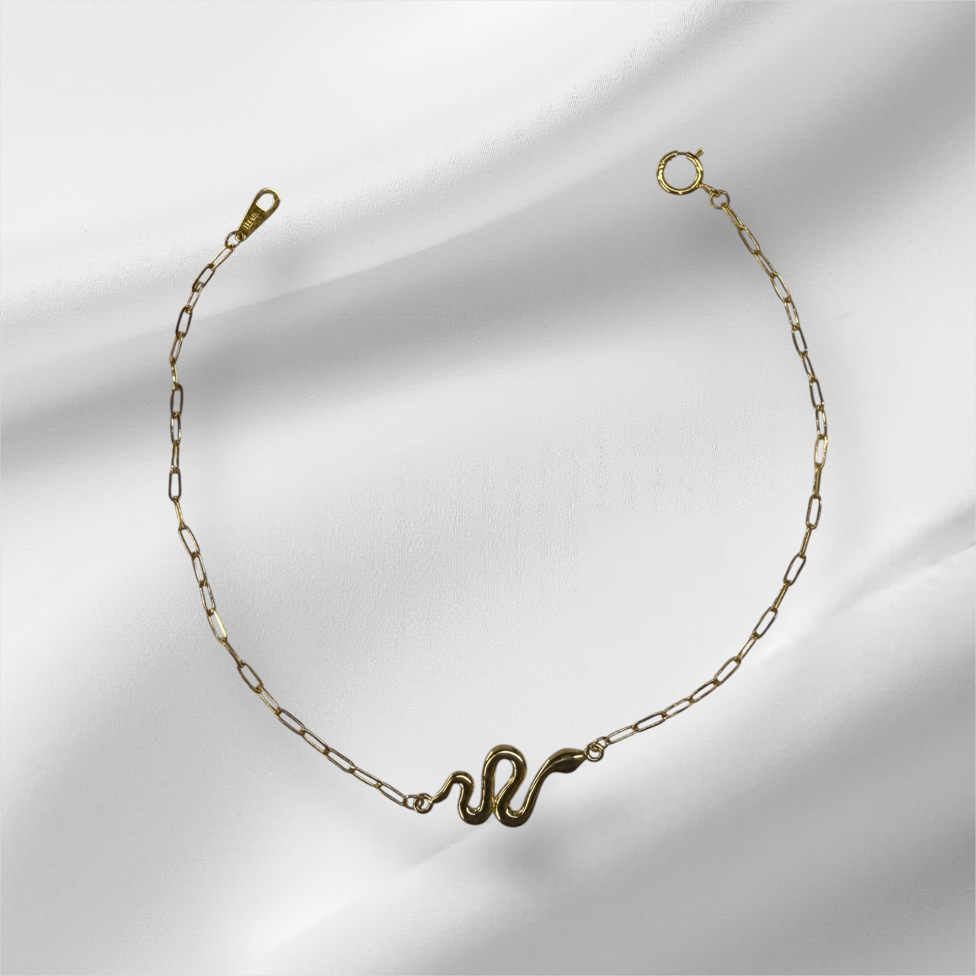 Esclava paperclip con serpiente en oro 14k