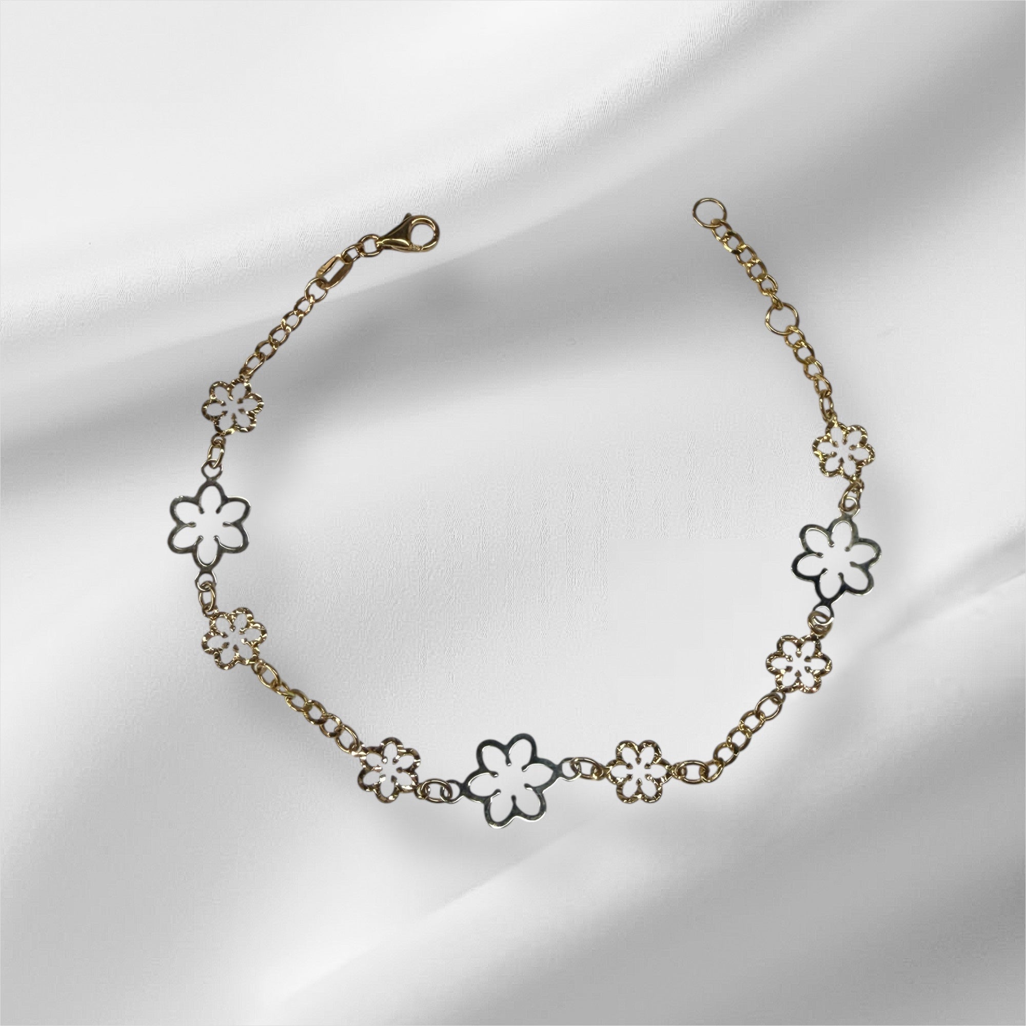 Esclava de flores de dos tonos oro 14k