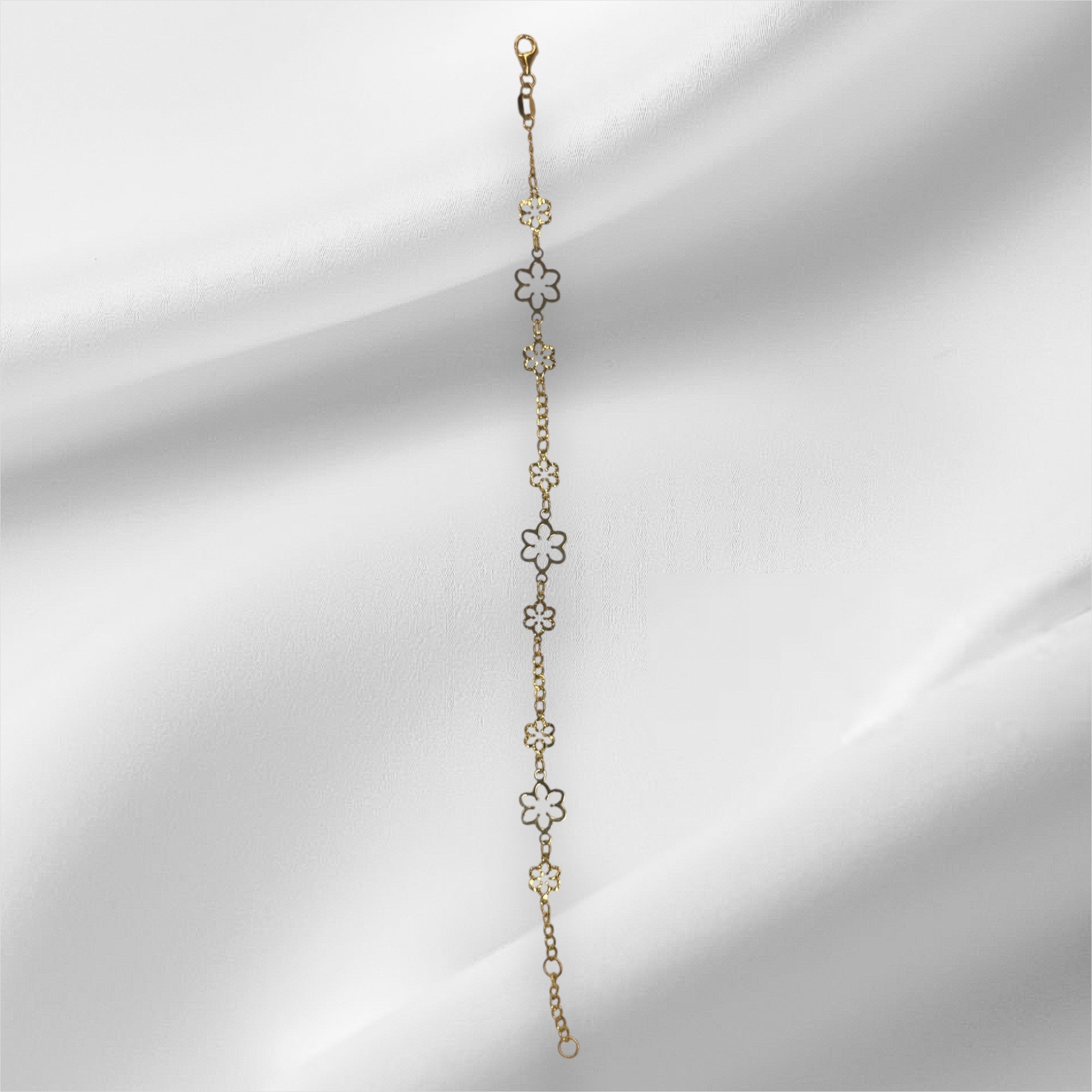 Esclava de flores de dos tonos oro 14k