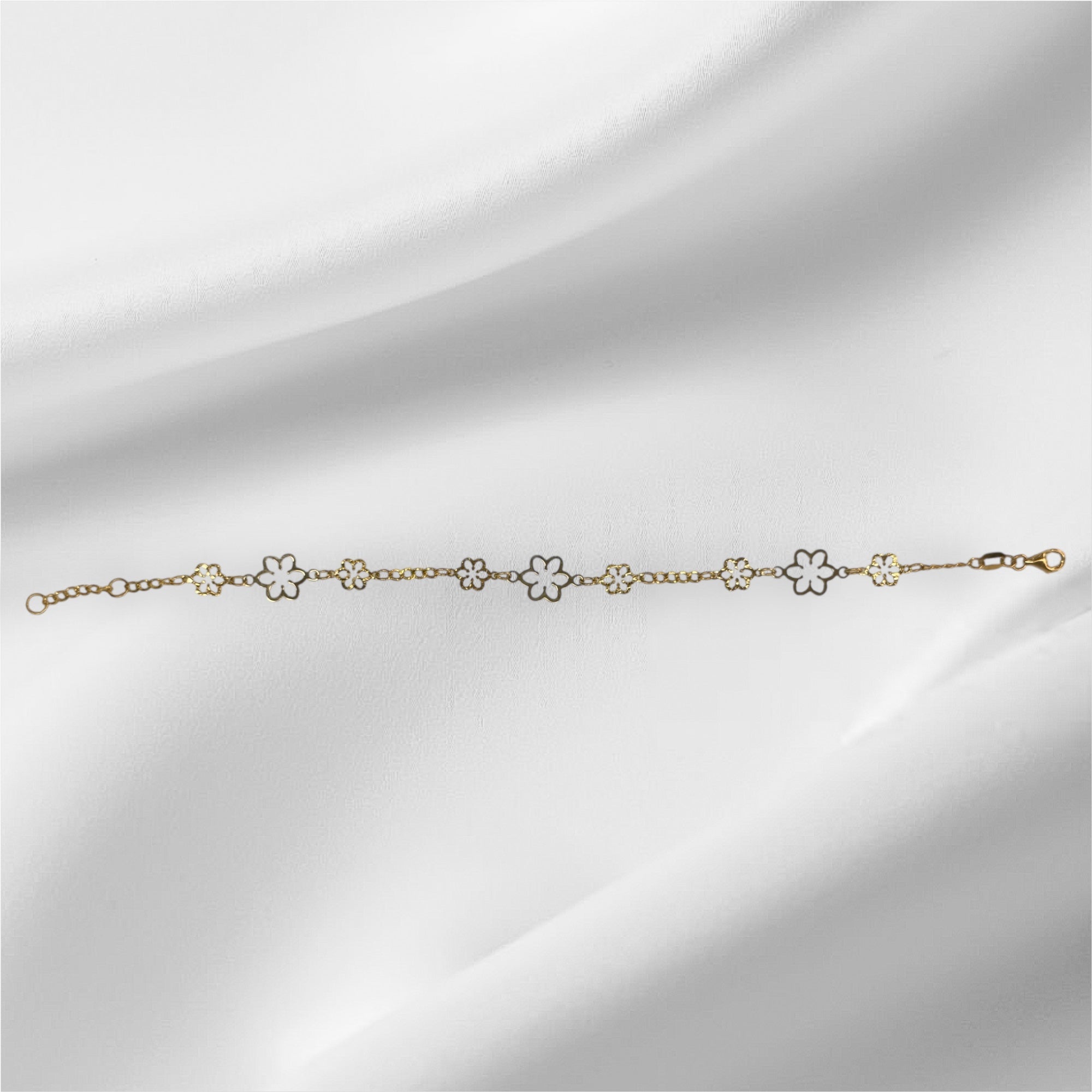 Esclava de flores de dos tonos oro 14k