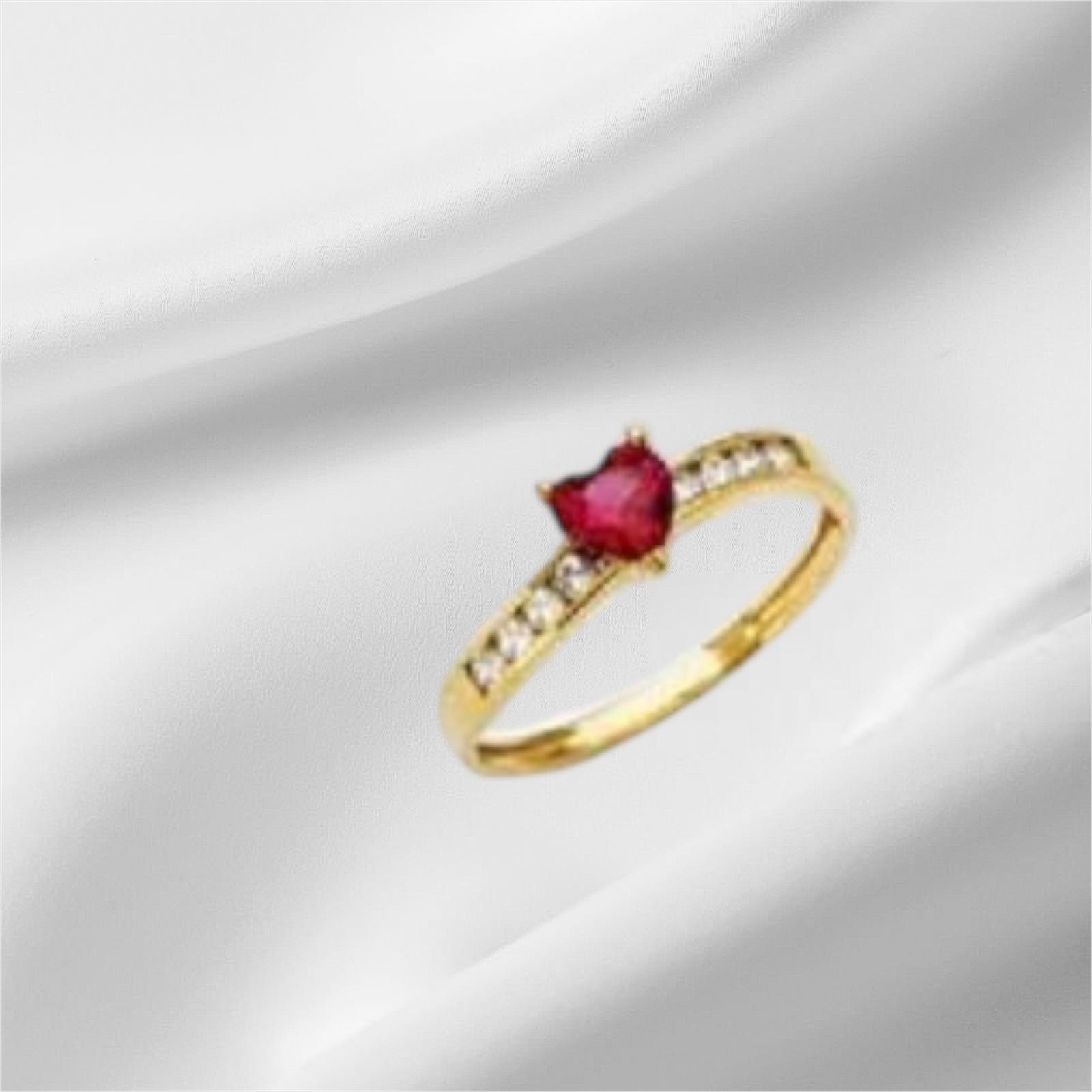 Anillo oro14k con piedra de corazón de circonia.