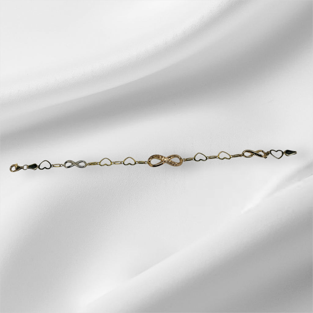 Esclava del infinito con corazones en oro 14k